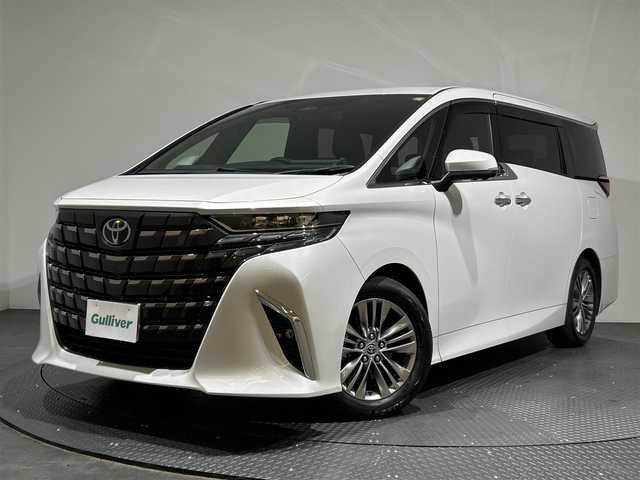 トヨタ アルファード Z 愛媛県 2024(令6)年 1.2万km プラチナホワイトパールマイカ ワンオーナー/純正14インチナビ/(Bluetooth/HDMI/フルセグ)/全周囲カメラ/レーダークルーズコントロール/デジタルインナーミラー/ワイヤレス充電/電動サイドサンシェード/ヘッドアップディスプレイ/オットマン/バックカメラウォッシャー/両側電動スライドドア/衝突被害軽減ブレーキ/前後コーナーセンサー/オートマチックハイビーム/オートライト/ガラスルーフ/パワーシート/ETC2.0/スペアキー/保証書/取扱説明書