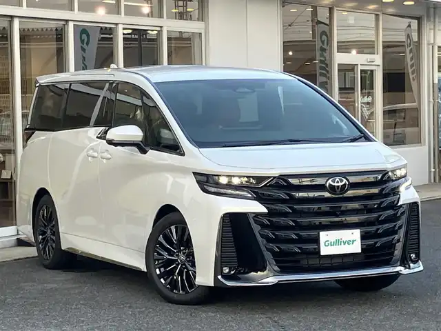 トヨタ ヴェルファイア Z プレミア 山口県 2025(令7)年 0.1千km プラチナホワイトパールマイカ ワンオーナー /14inディスプレイナビ・フルセグTV/14inフリップダウンモニター/JBLプレミアムサウンド/パノラミックビューカメラ/トヨタセーフティセンス/トヨタチームメイト/サンセットブラウンプレミアムナッパ革シート/快適温熱シート/パワーシート/左右独立ムーンルーフ/スペアタイヤ
