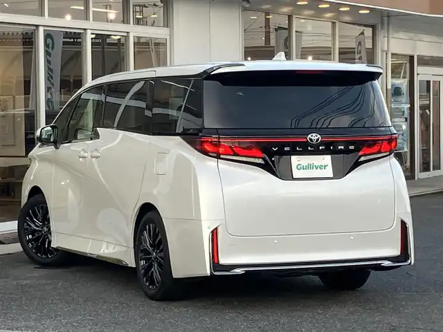 トヨタ ヴェルファイア Z プレミア 山口県 2025(令7)年 0.1千km プラチナホワイトパールマイカ ワンオーナー /14inディスプレイナビ・フルセグTV/14inフリップダウンモニター/JBLプレミアムサウンド/パノラミックビューカメラ/トヨタセーフティセンス/トヨタチームメイト/サンセットブラウンプレミアムナッパ革シート/快適温熱シート/パワーシート/左右独立ムーンルーフ/スペアタイヤ