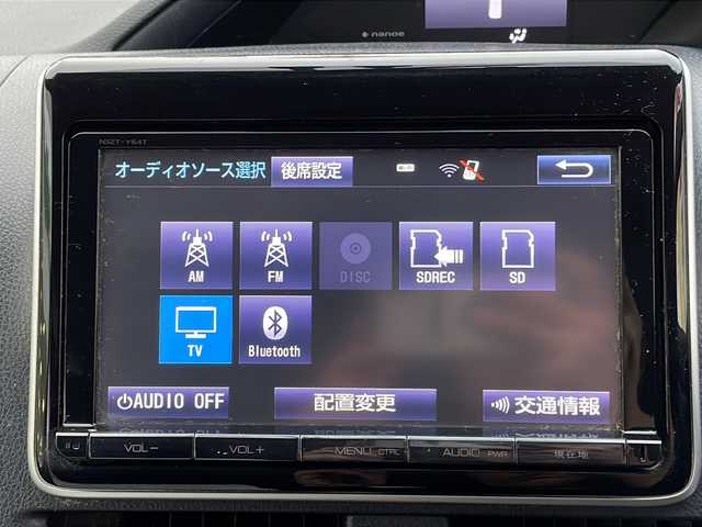 トヨタ ノア ハイブリッド G 沖縄県 2015(平27)年 18.5万km ボルドーマイカメタリック 純正ナビ・TV・Bluetooth・CD/DVD/バックカメラ/フリップダウンモニター/両側パワースライドドア/ETC/オートライト/LEDヘッドライト/シートヒーター/セーフティセンスC