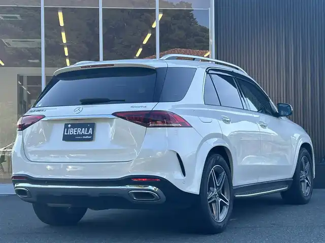 メルセデス・ベンツ Ｍ・ベンツ ＧＬＥ４００ｄ 4MATIC スポーツ 福岡県 2023(令5)年 2.5万km ダイヤモンドホワイト パノラマサンルーフ/レーダーセーフティパッケージ/黒革シート/全席シートヒーター/前席エアシート/エアーサスペンション/純正ナビ/Applecarplay/androidauto/全方位カメラ/フルセグTV/パワーバックドア/LEDヘッドライト/オートハイビーム/ヘッドアップディスプレイ/純正20インチアルミホイール/ETC2.0/スペアキー×1