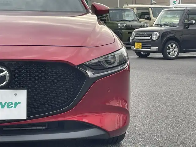 マツダ マツダ３ファストバック 20S プロアクティブ ツーリングS 広島県 2021(令3)年 7.6万km ソウルレッドクリスタルM ワンオーナー/メーカーオプションナビ/　（フルセグテレビ/Bluetooth/CD/DVD/AM/FM）/BOSEプレミアムサウンド/レーダークルーズコントロール/ETC/ドライブレコーダー/USB入力端子/HDMI/純正18インチアルミホイール/コーナーセンサー/メモリシート/アイドリングストップ/パワーシート/シートヒーター/ステアリングヒーター/LEDヘッドライト/パドルシフト/横滑り防止装置/衝突被害軽減システム/盗難防止装置/W＋サイドエアバック/カーテンエアバック/オートライト/スペアキー/保証書/取扱説明書
