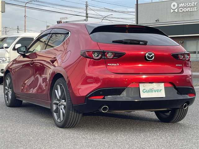 マツダ マツダ３ファストバック 20S プロアクティブ ツーリングS 広島県 2021(令3)年 7.6万km ソウルレッドクリスタルM ワンオーナー/メーカーオプションナビ/　（フルセグテレビ/Bluetooth/CD/DVD/AM/FM）/BOSEプレミアムサウンド/レーダークルーズコントロール/ETC/ドライブレコーダー/USB入力端子/HDMI/純正18インチアルミホイール/コーナーセンサー/メモリシート/アイドリングストップ/パワーシート/シートヒーター/ステアリングヒーター/LEDヘッドライト/パドルシフト/横滑り防止装置/衝突被害軽減システム/盗難防止装置/W＋サイドエアバック/カーテンエアバック/オートライト/スペアキー/保証書/取扱説明書