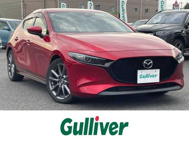 マツダ マツダ３ファストバック 20S プロアクティブ ツーリングS 広島県 2021(令3)年 7.6万km ソウルレッドクリスタルM ワンオーナー/メーカーオプションナビ/　（フルセグテレビ/Bluetooth/CD/DVD/AM/FM）/BOSEプレミアムサウンド/レーダークルーズコントロール/ETC/ドライブレコーダー/USB入力端子/HDMI/純正18インチアルミホイール/コーナーセンサー/メモリシート/アイドリングストップ/パワーシート/シートヒーター/ステアリングヒーター/LEDヘッドライト/パドルシフト/横滑り防止装置/衝突被害軽減システム/盗難防止装置/W＋サイドエアバック/カーテンエアバック/オートライト/スペアキー/保証書/取扱説明書