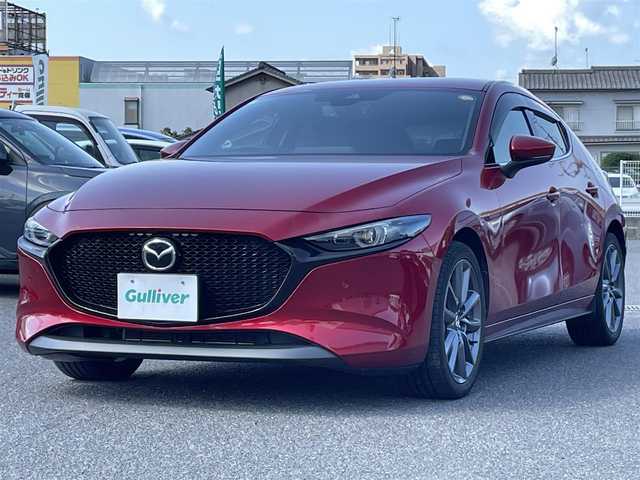 マツダ マツダ３ファストバック 20S プロアクティブ ツーリングS 広島県 2021(令3)年 7.6万km ソウルレッドクリスタルM ワンオーナー/メーカーオプションナビ/　（フルセグテレビ/Bluetooth/CD/DVD/AM/FM）/BOSEプレミアムサウンド/レーダークルーズコントロール/ETC/ドライブレコーダー/USB入力端子/HDMI/純正18インチアルミホイール/コーナーセンサー/メモリシート/アイドリングストップ/パワーシート/シートヒーター/ステアリングヒーター/LEDヘッドライト/パドルシフト/横滑り防止装置/衝突被害軽減システム/盗難防止装置/W＋サイドエアバック/カーテンエアバック/オートライト/スペアキー/保証書/取扱説明書