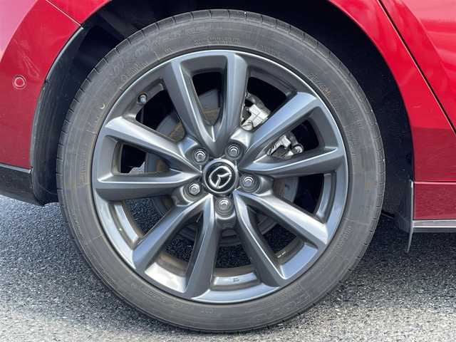 マツダ マツダ３ファストバック 20S プロアクティブ ツーリングS 広島県 2021(令3)年 7.6万km ソウルレッドクリスタルM ワンオーナー/メーカーオプションナビ/　（フルセグテレビ/Bluetooth/CD/DVD/AM/FM）/BOSEプレミアムサウンド/レーダークルーズコントロール/ETC/ドライブレコーダー/USB入力端子/HDMI/純正18インチアルミホイール/コーナーセンサー/メモリシート/アイドリングストップ/パワーシート/シートヒーター/ステアリングヒーター/LEDヘッドライト/パドルシフト/横滑り防止装置/衝突被害軽減システム/盗難防止装置/W＋サイドエアバック/カーテンエアバック/オートライト/スペアキー/保証書/取扱説明書