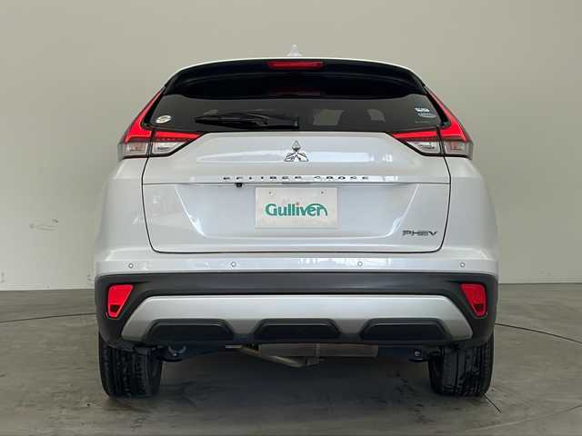 三菱 エクリプス クロス ＰＨＥＶ G 兵庫県 2020(令2)年 4.6万km ホワイトダイヤモンド ・社外ナビ（フルセグ・BD・SD・BT）/・ETC/・前後ドライブレコーダー/・レーダークルーズコントロール/・ヘッドアップディスプレイ/・横滑り防止装置/・車線逸脱警報/・衝突軽減ブレーキ/・AC1500W電源/・パドルシフト/・シートヒーター/・パワーシート/・LEDオートライト/・フォグランプ/・オートマチックハイビーム/・ステアリングヒーター/・電動パーキングブレーキ/・ブレーキホールド/・ステアリングリモコン/・純正18インチアルミホイール/・フロアマット/・コーダーセンサー/・ドアバイザー/・プッシュスタート/・スマートキー/・W＋サイドエアバック/・カーテンエアバック/・オールオートパワーウィンドウ/・防眩ルームミラー