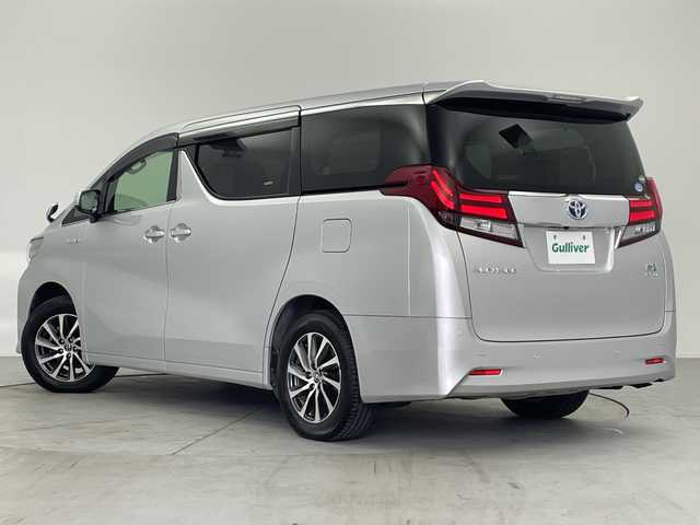 トヨタ アルファードハイブリット G 愛知県 2017(平29)年 5.4万km シルバーM /純正９インチナビ　//ＣＤ　ＤＶＤ　フルセグＴＶ　ＳＤ　ＦＭ　ＡＭ　//バックカメラ　//両側パワースライドドア　//ビルトインＥＴＣ　//ドライブレコーダー//スマートキー//スペアキー　//オットマン　//取扱説明書　//LEDオートヘッドライト//クルーズコントロール　//後席ロールサンシェード//前席パワーシート//シートメモリー//革巻きステアリング//電動パーキングブレーキ//純正フロアマット//純正ドアバイザー//215/65/R16スタッドレス付AW積込