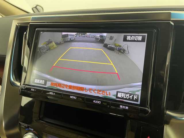 トヨタ アルファードハイブリット G 愛知県 2017(平29)年 5.4万km シルバーM /純正９インチナビ　//ＣＤ　ＤＶＤ　フルセグＴＶ　ＳＤ　ＦＭ　ＡＭ　//バックカメラ　//両側パワースライドドア　//ビルトインＥＴＣ　//ドライブレコーダー//スマートキー//スペアキー　//オットマン　//取扱説明書　//LEDオートヘッドライト//クルーズコントロール　//後席ロールサンシェード//前席パワーシート//シートメモリー//革巻きステアリング//電動パーキングブレーキ//純正フロアマット//純正ドアバイザー//215/65/R16スタッドレス付AW積込