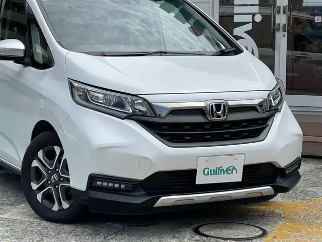 ホンダ フリード クロスター ホンダセンシング 神奈川県 2020(令2)年 1.8万km プラチナホワイトパール ワンオーナー/純正メモリナビ/　（CD・DVD・Bluetooth）/フルセグTV/純正フリップダウンモニター/両側パワースライドドア/ホンダセンシング/アダプティブクルーズコントロール/バックカメラ/ビルトインETC/LEDヘッドライト/LEDフォグライト/ハーフレザーシート/スマートキー/純正15インチAW/保証書/取扱説明書
