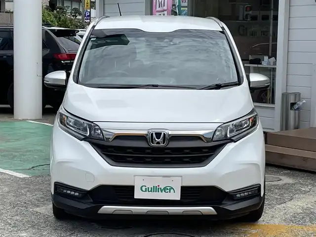 ホンダ フリード クロスター ホンダセンシング 神奈川県 2020(令2)年 1.8万km プラチナホワイトパール ワンオーナー/純正メモリナビ/　（CD・DVD・Bluetooth）/フルセグTV/純正フリップダウンモニター/両側パワースライドドア/ホンダセンシング/アダプティブクルーズコントロール/バックカメラ/ビルトインETC/LEDヘッドライト/LEDフォグライト/ハーフレザーシート/スマートキー/純正15インチAW/保証書/取扱説明書