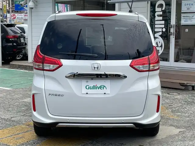 ホンダ フリード クロスター ホンダセンシング 神奈川県 2020(令2)年 1.8万km プラチナホワイトパール ワンオーナー/純正メモリナビ/　（CD・DVD・Bluetooth）/フルセグTV/純正フリップダウンモニター/両側パワースライドドア/ホンダセンシング/アダプティブクルーズコントロール/バックカメラ/ビルトインETC/LEDヘッドライト/LEDフォグライト/ハーフレザーシート/スマートキー/純正15インチAW/保証書/取扱説明書