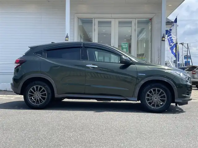 ホンダ ヴェゼル ハイブリッド X 秋田県 2014(平26)年 10.5万km ミスティックグリーンパール (株)IDOMが運営する【じしゃロン 秋田店】の自社ローン専用車両になります。こちらは現金またはオートローンご利用時の価格です。自社ローンご希望の方は別途その旨お申付け下さい/４WD/スマートキー/クルーズコントロール/シートヒーター/ETC