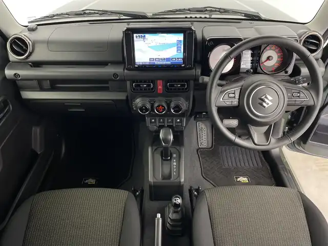 スズキ ジムニー シエラ JC 鹿児島県 2024(令6)年 1.5万km ジャングルグリーン 社外SDナビ/（AM/FM/CD/DVD/Bluetooth)/フルセグテレビ/バックカメラ/衝突軽減ブレーキ/クルーズコントロール/前席シートヒーター/ＥＴＣ/4WD/前後ドライブレコーダー/ＬＥＤヘッドライト/ヘッドライトウォッシャー/オートライト/アイドリングストップ/スマートキー/純正フロアマット