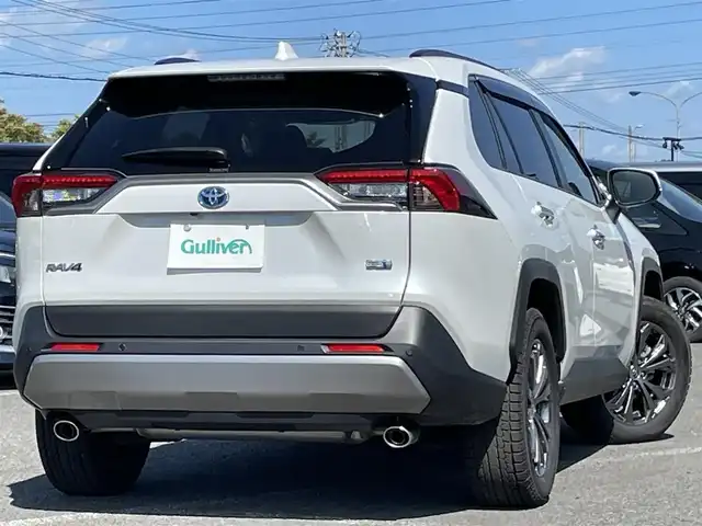 トヨタ ＲＡＶ４ ハイブリッドG 道央・札幌 2024(令6)年 1万km プラチナホワイトパールマイカ ４WD/寒冷地仕様/純正メーカーナビ/AM/FM/BT/フルセグ/トヨタセーフティセンス/プリクラッシュセーフティ/横滑り防止装置/レーダークルーズコントロール/レーンキープアシスト/クリアランスソナー/ブラインドスポットモニター/パーキングサポートブレーキ/リアクロストラフィックアラート/ロードサインアシスト/アラウンドビューモニター/ビルトインETC2.0/ミラー一体型ドライブレコーダー/パワーバックドア/D席パワーシート/前席シートヒーター/前席エアシート/レザーシート/革巻きステアリング/ステアリングリモコン/ハンドルヒーター/プッシュスタート/スマートキー/LEDヘッドライト/オートライト/オートハイビーム/フォグランプ/電動格納ミラー/純正フロアマット/ドアバイザー