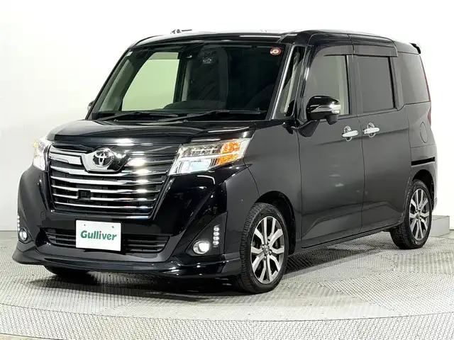 トヨタ ルーミー カスタムG－T 大阪府 2018(平30)年 2.6万km ブラックマイカメタリック ALPINE9incナビTV バックカメラ フリップダウンモニター 両側パワースライドドア シートヒーター クルーズコントロール 衝突軽減ブレーキ レーンアシスト スマートキー プッシュスタート ドライブレコーダー ETC