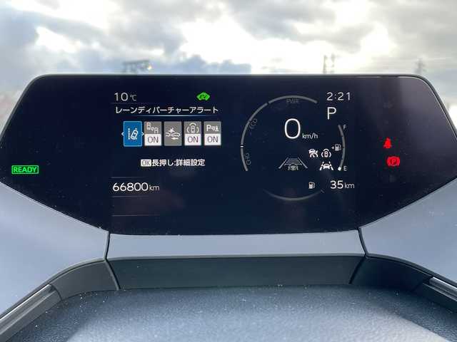 トヨタ プリウス Z 岐阜県 2024(令6)年 6.7万km プラチナホワイトパールマイカ 登録時走行距離66800ｋｍ/純正12.3型ディスプレイオーディオ/フルセグＴＶ/全方位カメラ（アラウンドビューモニター）/バックカメラ/Blue tooth・USB/ビルトインETC2.0/トヨタセーフティセンス/ブラインドスポットモニター/コーナーセンサー前後/レーダークルーズコントロール/レーンキープアシスト/LEDヘッドライト/オートマチックハイビーム/オートライト/横滑り防止装置/ドライブレコーダー/盗難防止装置/SRSエアバッグシステム運転席・助手席+サイド/カーテンエアバッグ/レザーシート/パワーシート運転席/エアシート前席/シートヒーター前席/電動リアゲート/純正フロアマット/ステアリングヒーター/プッシュスタート/スマートキー/スペアキー1本/アイドリングストップ/AC100V電源/ドアバイザー/保証書/記録簿/禁煙車