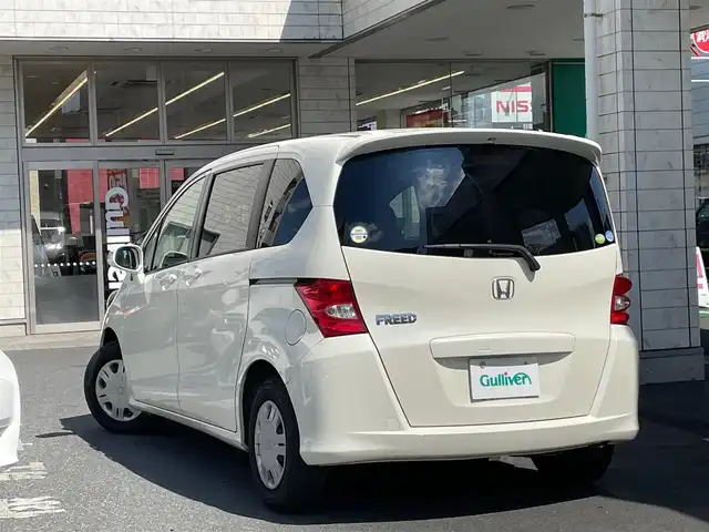 ホンダ フリード G ジャストセレクション 東京都 2010(平22)年 3万km プレミアムホワイトパール ワンオーナー/純正SDナビ/・ワンセグTV/・Bluetooth接続/助手席側パワースライドドア/オートエアコン/ETC/三列目シート/ウォークスルー/純正フロアマット/HIDヘッドランプ/スペアキー/エアバッグ/横滑り防止/ABS/保証書・取説