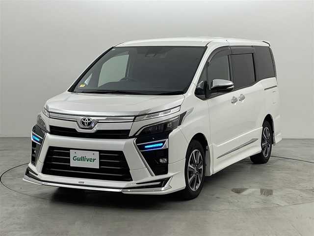 トヨタ ヴォクシー ZS 煌Ⅱ 福岡県 2020(令2)年 6.5万km ホワイトパールクリスタルシャイン モデリスタエアロ　/フリップダウンモニター　/純正１０型ナビ　/バックカメラ　/ビルトインＥＴＣ　/３６０°ドラレコ　/クルーズコントロール　/コーナーセンサー/衝突被害軽減ブレーキ　/レーンキープ　/ＰＫＳＢ　/ＭＴモード付き　/両側電動スライドドア