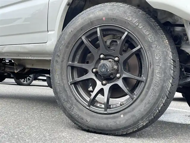 スズキ ジムニー クロスアドベンチャー 青森県 2013(平25)年 7.1万km 白 ４WD/社外オーディオ（CD/AMFM）/ETＣ/シートヒーター/パワーウインドウ/純正フロアマット