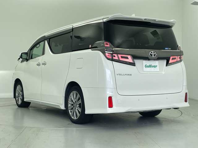 トヨタ ヴェルファイア Z ゴールデンアイズ 愛知県 2020(令2)年 3.2万km ホワイトパールクリスタルシャイン 純正９型ディスプレイオーディオ（ナビ有）/衝突軽減システム/・レーダークルーズコントロール/・レーンキープアシスト/・横滑り防止機能/サンルーフ/両側パワースライドドア/三眼LEDヘッドライト/フルセグTV/Bluetooth/バックカメラ/オットマン/ドライブレコーダー/電動リアゲート/コーナーセンサー/純正アルミホイール/ビルトインETC/WAC/オートマチックハイビーム/ステアリングスイッチ/スマートキー/プッシュスタート
