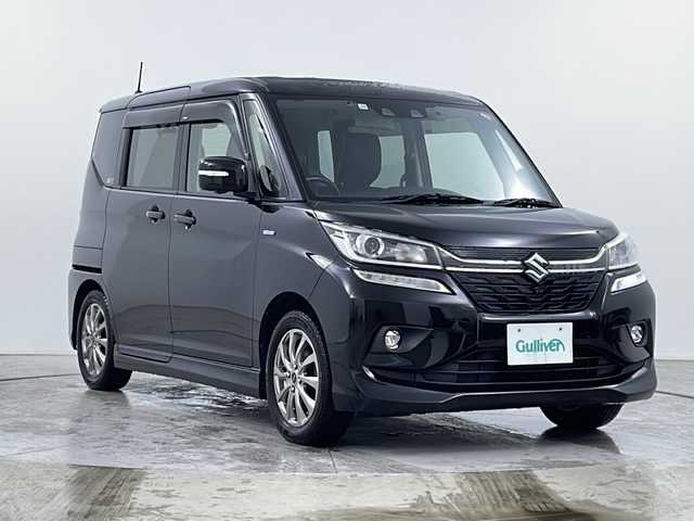 スズキ ソリオ バンディット HV MV 道央・札幌 2019(令1)年 7.1万km スーパーブラックパール ・4WD/・ハイブリッド/・デュアルカメラブレーキサポート/・スズキ純正ナビ　(AVIC-RLS901)/・Bluetooth/DTV/MSV/IPOD/・全方位カメラ/・前後ドライブレコーダー/・片側パワースライドドア/・レーダークルーズコントロール/・レザー調シートカバー/・運転席・助手席　シートヒーター/・パドルシフト/・USB入力端子/・純正フロアマット/・横滑り防止装置/・レーンアシスト/・アイドリングストップ/・社外エンジンスターター/・スマートキー/・ビルトインETC/・積み込みサマータイヤアルミホイール付き