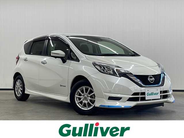日産 ノート e－パワー X 長崎県 2018(平30)年 6.6万km ブリリアントホワイトパール 純正SDナビ（MM318D-W）/（フルセグ/CD/DVD/BTA）/エアロ（前/横/後/後下）/衝突被害軽減ブレーキ/前後コーナーセンサー/横滑り防止装置/純正フロアマット/社外14インチアルミホイール/AAC/ETC/純正ドラレコ/デジタルインナーミラー/プッシュスタート/スマートキー/純正ドアバイザー