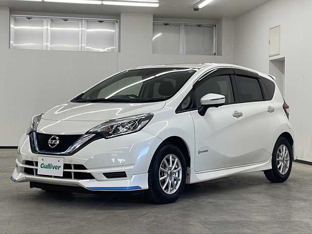 日産 ノート e－パワー X 長崎県 2018(平30)年 6.6万km ブリリアントホワイトパール 純正SDナビ（MM318D-W）/（フルセグ/CD/DVD/BTA）/エアロ（前/横/後/後下）/衝突被害軽減ブレーキ/前後コーナーセンサー/横滑り防止装置/純正フロアマット/社外14インチアルミホイール/AAC/ETC/純正ドラレコ/デジタルインナーミラー/プッシュスタート/スマートキー/純正ドアバイザー