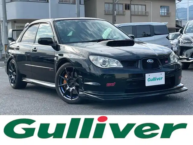 スバル インプレッサ ＷＲＸ STi 島根県 2006(平18)年 13.3万km オブシディアンブラックパール 社外HDDナビ　/DVD再生　/ETC　/純正HIDヘッドライト　/社外１８インチアルミホイール（wedsSport）/社外マフラー/ブレンボキャリパー　/純正フロアマット