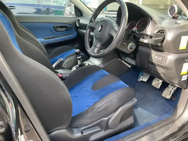 スバル インプレッサ ＷＲＸ STi 島根県 2006(平18)年 13.3万km オブシディアンブラックパール 社外HDDナビ　/DVD再生　/ETC　/純正HIDヘッドライト　/社外１８インチアルミホイール（wedsSport）/社外マフラー/ブレンボキャリパー　/純正フロアマット