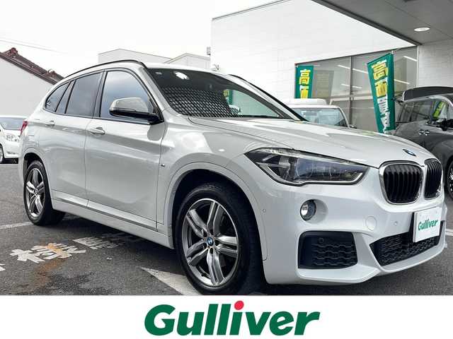 ＢＭＷ Ｘ１ xDrive 18d Mスポーツ ハイライン 愛知県 2019(令1)年 6.6万km アルピンホワイトⅢ 4WD/ディーゼル・ターボ/メーカーオプション/ハイラインパッケージ/-パーフォレーテッドダコタレザーシート/-フロントシートヒーティング/-ファインウッドオークグレインマットインテリアトリム/コンフォートパッケージ/-オートマチックテールゲートオペレーション/-スライディングリヤシート/-電動フロントシート運転席メモリー機能付/主要装備/インテリジェントセーフティ/純正HDDナビ/(DVD/Bt/USB)/バックカメラ/ミラー一体型ETC/スマートキー/前後バンパーソナー/ダウンヒルアシスト/18インチアルミホイール/LEDオートライト/シルバールーフレール/ウインカーミラー/前後フォグランプ/革巻きステア/ノブ/オーディオ/ステアスイッチ/オートワイパー/電格調整ミラー/レーンキーピングアシスト/パーキングアシスト/ヒルクライムアシスト/横滑り防止機能/W/サイド/カーテンエアバッグ/ABS/スマートキー/保証書/取説/記録簿