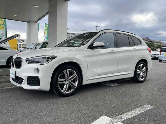 ＢＭＷ Ｘ１ xDrive 18d Mスポーツ ハイライン 愛知県 2019(令1)年 6.6万km アルピンホワイトⅢ 4WD/ディーゼル・ターボ/メーカーオプション/ハイラインパッケージ/-パーフォレーテッドダコタレザーシート/-フロントシートヒーティング/-ファインウッドオークグレインマットインテリアトリム/コンフォートパッケージ/-オートマチックテールゲートオペレーション/-スライディングリヤシート/-電動フロントシート運転席メモリー機能付/主要装備/インテリジェントセーフティ/純正HDDナビ/(DVD/Bt/USB)/バックカメラ/ミラー一体型ETC/スマートキー/前後バンパーソナー/ダウンヒルアシスト/18インチアルミホイール/LEDオートライト/シルバールーフレール/ウインカーミラー/前後フォグランプ/革巻きステア/ノブ/オーディオ/ステアスイッチ/オートワイパー/電格調整ミラー/レーンキーピングアシスト/パーキングアシスト/ヒルクライムアシスト/横滑り防止機能/W/サイド/カーテンエアバッグ/ABS/スマートキー/保証書/取説/記録簿