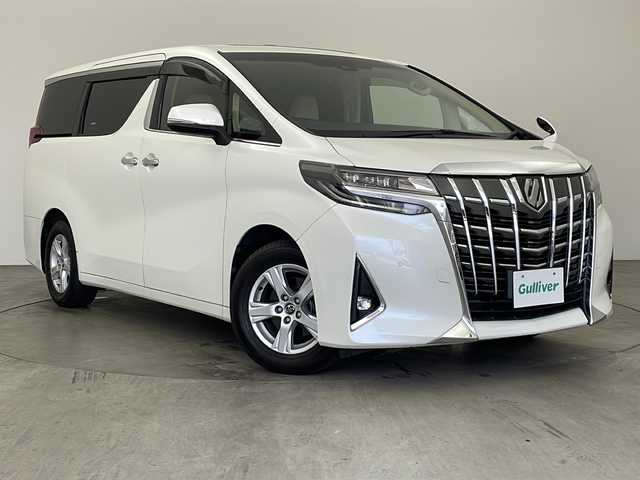 トヨタ アルファード X 兵庫県 2018(平30)年 6.2万km ホワイトパールクリスタルシャイン ・純正ナビ/Bluetooth/CD/DVD/TV/SD/・フリップダウンモニター/・バックカメラ/・トヨタセーフティセンス/・衝突軽減ブレーキ/・レーンキープアシスト/・レーダークルーズコントロール/・電動パーキングブレーキ/・ブレーキホールド/・クリアランスソナー/・前後コーナーセンサー/・MTモード付AT/・両側パワースライドドア/・サンルーフ/・AC100V電源/・WAC/・純正16インチアルミホイール/・純正スマートキー/・プッシュスタートボタン/・スペアキー/・ステアリングリモコン/・革巻きステアリング/・W＋サイドエアバッグ/・カーテンエアバッグ/・LEDオートライト/・オートマチックハイビーム/・ビルドインETC