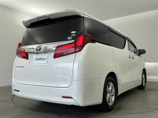 トヨタ アルファード X 兵庫県 2018(平30)年 6.2万km ホワイトパールクリスタルシャイン ・純正ナビ/Bluetooth/CD/DVD/TV/SD/・フリップダウンモニター/・バックカメラ/・トヨタセーフティセンス/・衝突軽減ブレーキ/・レーンキープアシスト/・レーダークルーズコントロール/・電動パーキングブレーキ/・ブレーキホールド/・クリアランスソナー/・前後コーナーセンサー/・MTモード付AT/・両側パワースライドドア/・サンルーフ/・AC100V電源/・WAC/・純正16インチアルミホイール/・純正スマートキー/・プッシュスタートボタン/・スペアキー/・ステアリングリモコン/・革巻きステアリング/・W＋サイドエアバッグ/・カーテンエアバッグ/・LEDオートライト/・オートマチックハイビーム/・ビルドインETC