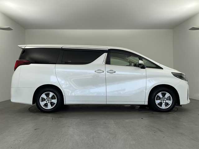 トヨタ アルファード X 兵庫県 2018(平30)年 6.2万km ホワイトパールクリスタルシャイン ・純正ナビ/Bluetooth/CD/DVD/TV/SD/・フリップダウンモニター/・バックカメラ/・トヨタセーフティセンス/・衝突軽減ブレーキ/・レーンキープアシスト/・レーダークルーズコントロール/・電動パーキングブレーキ/・ブレーキホールド/・クリアランスソナー/・前後コーナーセンサー/・MTモード付AT/・両側パワースライドドア/・サンルーフ/・AC100V電源/・WAC/・純正16インチアルミホイール/・純正スマートキー/・プッシュスタートボタン/・スペアキー/・ステアリングリモコン/・革巻きステアリング/・W＋サイドエアバッグ/・カーテンエアバッグ/・LEDオートライト/・オートマチックハイビーム/・ビルドインETC