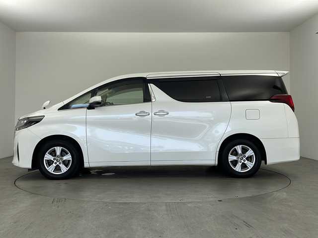 トヨタ アルファード X 兵庫県 2018(平30)年 6.2万km ホワイトパールクリスタルシャイン ・純正ナビ/Bluetooth/CD/DVD/TV/SD/・フリップダウンモニター/・バックカメラ/・トヨタセーフティセンス/・衝突軽減ブレーキ/・レーンキープアシスト/・レーダークルーズコントロール/・電動パーキングブレーキ/・ブレーキホールド/・クリアランスソナー/・前後コーナーセンサー/・MTモード付AT/・両側パワースライドドア/・サンルーフ/・AC100V電源/・WAC/・純正16インチアルミホイール/・純正スマートキー/・プッシュスタートボタン/・スペアキー/・ステアリングリモコン/・革巻きステアリング/・W＋サイドエアバッグ/・カーテンエアバッグ/・LEDオートライト/・オートマチックハイビーム/・ビルドインETC