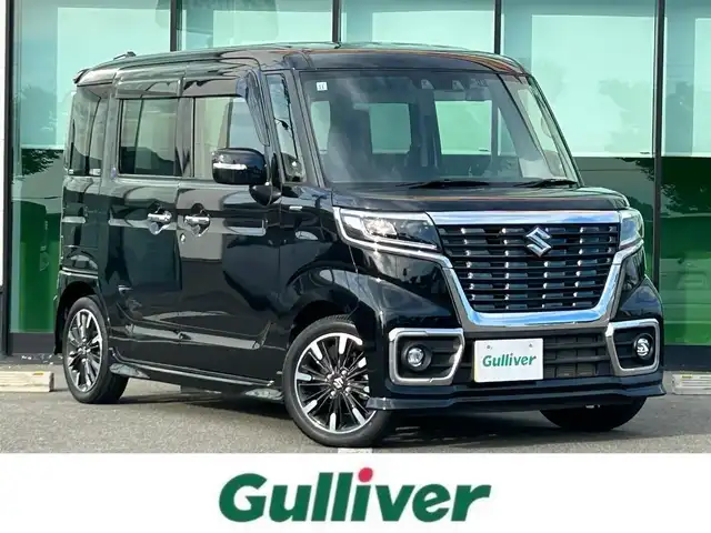 スズキ スペーシア カスタム HYBRID XS 和歌山県 2021(令3)年 2.7万km ブルーイッシュブラックパール3 社外ナビ/フルセグTV/バックカメラ/両側パワースライドドア/デュアルセンサーブレーキサポート/レーダークルーズコントロール/コーナーセンサー/ETC/純正アルミホイール/シートヒーター/シートバックテーブル/リアサーキュレーター/LEDヘッドライト