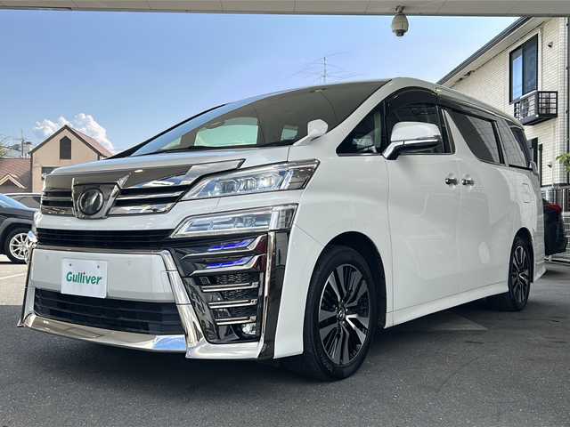 トヨタ ヴェルファイア Z Gエディション 京都府 2018(平30)年 10.3万km ホワイトパールクリスタルシャイン 10インチ純正SDナビ（NSZT-Z66T)/フルセグTV/Bluetooth/CD/DVD/USB/バックカメラ/12.8インチフリップダウンモニター/レーダクルーズコントロール/電動リアゲート/3眼LEDヘッドライト/デジタルインナーミラー/ステアリングヒーター/両側パワースライドドア/ビルトインETC/全方位ドライブレコーダ/シートヒーター/ベンチレーター/メモリー付きパワーシート/純正フロアマット/禁煙車