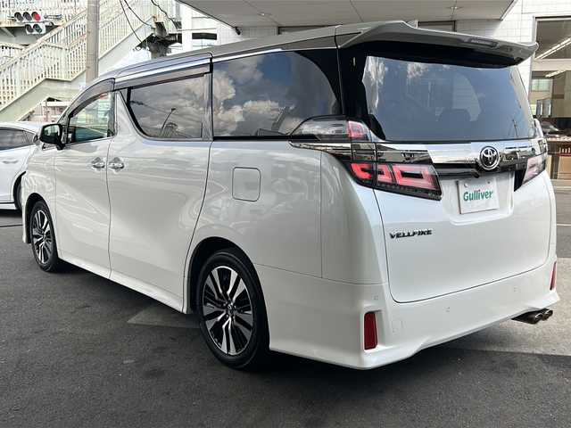 トヨタ ヴェルファイア Z Gエディション 京都府 2018(平30)年 10.3万km ホワイトパールクリスタルシャイン 10インチ純正SDナビ（NSZT-Z66T)/フルセグTV/Bluetooth/CD/DVD/USB/バックカメラ/12.8インチフリップダウンモニター/レーダクルーズコントロール/電動リアゲート/3眼LEDヘッドライト/デジタルインナーミラー/ステアリングヒーター/両側パワースライドドア/ビルトインETC/全方位ドライブレコーダ/シートヒーター/ベンチレーター/メモリー付きパワーシート/純正フロアマット/禁煙車