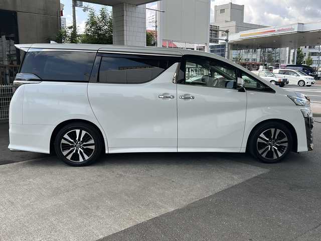 トヨタ ヴェルファイア Z Gエディション 京都府 2018(平30)年 10.3万km ホワイトパールクリスタルシャイン 10インチ純正SDナビ（NSZT-Z66T)/フルセグTV/Bluetooth/CD/DVD/USB/バックカメラ/12.8インチフリップダウンモニター/レーダクルーズコントロール/電動リアゲート/3眼LEDヘッドライト/デジタルインナーミラー/ステアリングヒーター/両側パワースライドドア/ビルトインETC/全方位ドライブレコーダ/シートヒーター/ベンチレーター/メモリー付きパワーシート/純正フロアマット/禁煙車