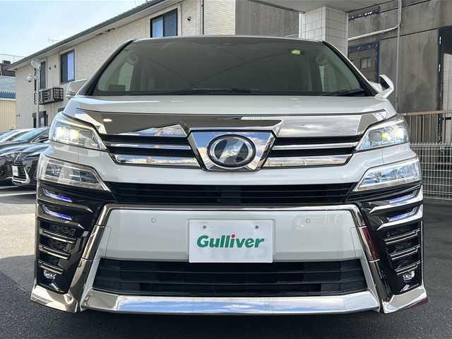 トヨタ ヴェルファイア Z Gエディション 京都府 2018(平30)年 10.3万km ホワイトパールクリスタルシャイン 10インチ純正SDナビ（NSZT-Z66T)/フルセグTV/Bluetooth/CD/DVD/USB/バックカメラ/12.8インチフリップダウンモニター/レーダクルーズコントロール/電動リアゲート/3眼LEDヘッドライト/デジタルインナーミラー/ステアリングヒーター/両側パワースライドドア/ビルトインETC/全方位ドライブレコーダ/シートヒーター/ベンチレーター/メモリー付きパワーシート/純正フロアマット/禁煙車