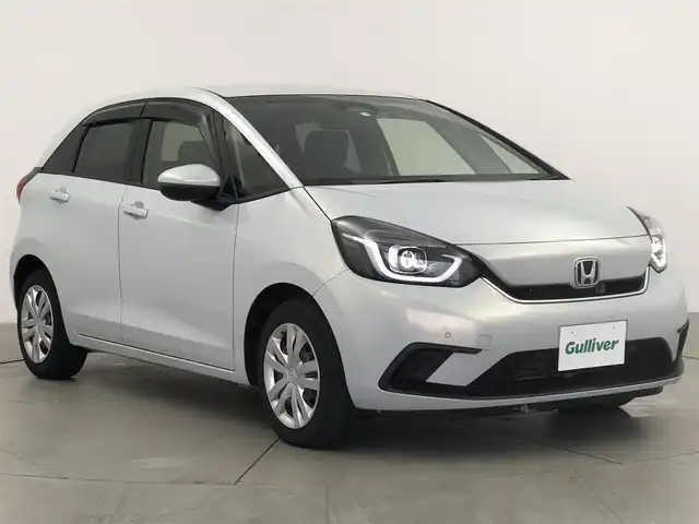 ホンダ フィット e:HEVホーム 愛知県 2020(令2)年 1.3万km プレミアムサンライトホワイトパール ・純正9インチナビ/・バックカメラ/・Bluetooth/・フルセグTV/・ホンダセンシング/・衝突被害軽減システム/・コーナーセンサー/・クルーズコントロール/・レーンキープアシスト/・横滑り防止装置/・オートライト/・LEDヘッドライト/・ドライブレコーダー/・ETC/・プッシュスタート/・スマートキー