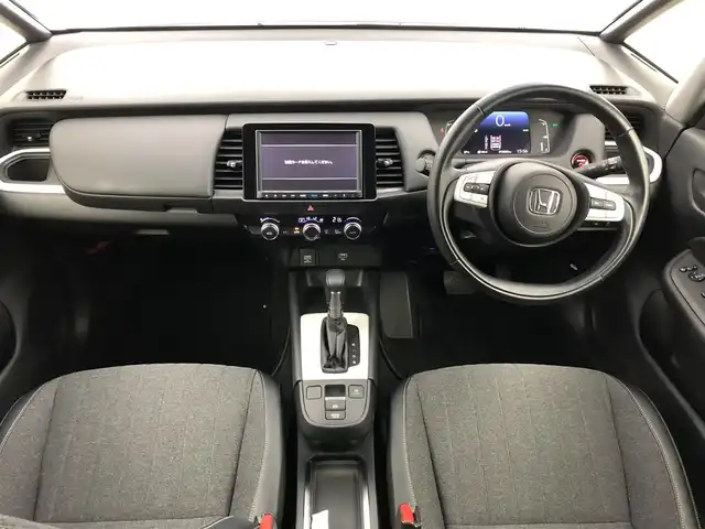 ホンダ フィット e:HEVホーム 愛知県 2020(令2)年 1.3万km プレミアムサンライトホワイトパール ・純正9インチナビ/・バックカメラ/・Bluetooth/・フルセグTV/・ホンダセンシング/・衝突被害軽減システム/・コーナーセンサー/・クルーズコントロール/・レーンキープアシスト/・横滑り防止装置/・オートライト/・LEDヘッドライト/・ドライブレコーダー/・ETC/・プッシュスタート/・スマートキー