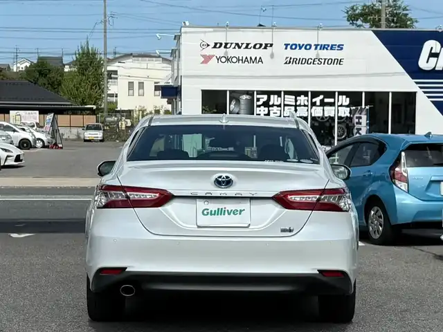 トヨタ カムリ G 愛知県 2020(令2)年 2.4万km プラチナホワイトパールマイカ /ワンオーナー車//純正ディスプレイオーディオ//AM/FM/USB/フルセグ/BT/Miracast//レーダークルーズコントロール//ブラインドスポットモニター//プリクラッシュセーフティー//ETC//リヤクロストラフィックアラート//レーンディパーチャーアラート//パーキングサポートブレーキ//クリアランスソナー//オートLEDヘッドライト//オートハイビーム//フォグランプ//ブレーキホールド//電動パーキングブレーキ//オートリトラクタブルウィンカーミラー//スマートキー//スペアキー//プッシュスタート//純正フロアマット//純正ドアバイザー//照明付きバニティミラー//ステアリングスイッチ//EV MODE//ECO MODE//NORMAL MODE//SPORT MODE//ISOFIX//保証書//取扱説明書//マルチメディア説明書//ナビ説明書
