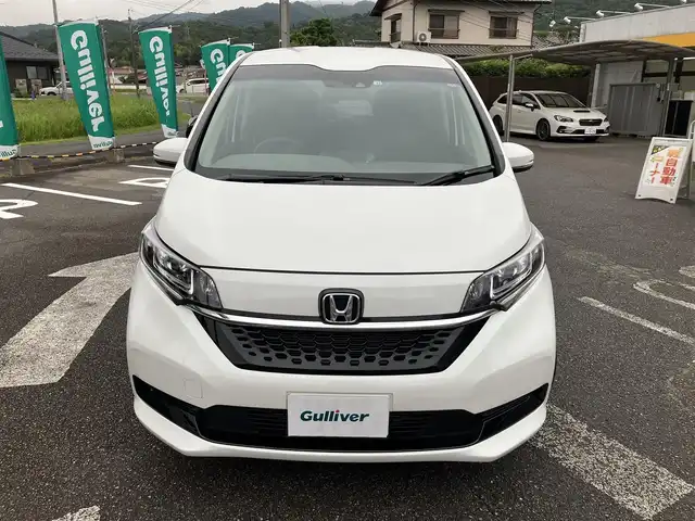 ホンダ フリード G 広島県 2022(令4)年 2.6万km プラチナホワイトパール ワンオーナー/ホンダセンシング/レーダークルーズ/両側パワースライドドア/純正ナビゲーション/バックカメラ（3画面切り替え付き）/フルセグTV/Bluetooth/シートヒーター（運転席・助手席）/LEDオートライト/USB端子/社外ドラレコ/新車保証書/取扱説明書/スペアキー