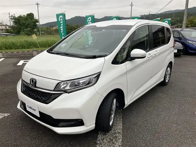 ホンダ フリード G 広島県 2022(令4)年 2.6万km プラチナホワイトパール ワンオーナー/ホンダセンシング/レーダークルーズ/両側パワースライドドア/純正ナビゲーション/バックカメラ（3画面切り替え付き）/フルセグTV/Bluetooth/シートヒーター（運転席・助手席）/LEDオートライト/USB端子/社外ドラレコ/新車保証書/取扱説明書/スペアキー