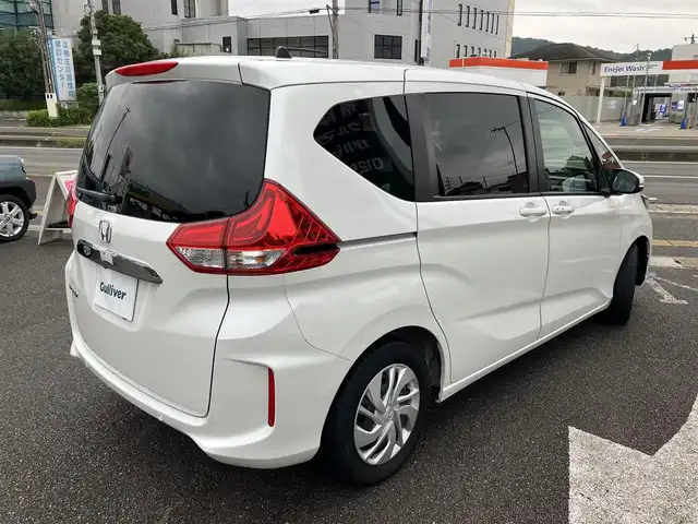 ホンダ フリード G 広島県 2022(令4)年 2.6万km プラチナホワイトパール ワンオーナー/ホンダセンシング/レーダークルーズ/両側パワースライドドア/純正ナビゲーション/バックカメラ（3画面切り替え付き）/フルセグTV/Bluetooth/シートヒーター（運転席・助手席）/LEDオートライト/USB端子/社外ドラレコ/新車保証書/取扱説明書/スペアキー