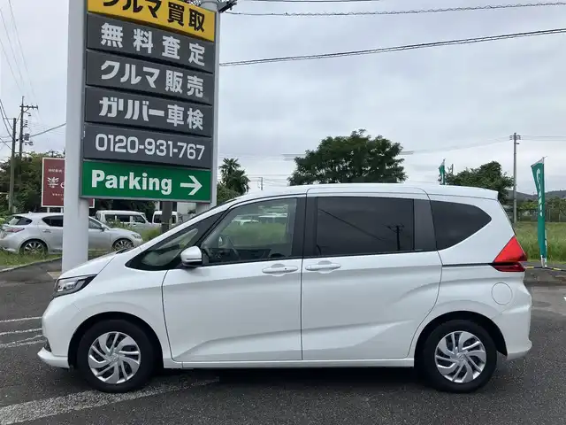 ホンダ フリード G 広島県 2022(令4)年 2.6万km プラチナホワイトパール ワンオーナー/ホンダセンシング/レーダークルーズ/両側パワースライドドア/純正ナビゲーション/バックカメラ（3画面切り替え付き）/フルセグTV/Bluetooth/シートヒーター（運転席・助手席）/LEDオートライト/USB端子/社外ドラレコ/新車保証書/取扱説明書/スペアキー