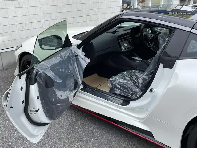 日産 フェアレディ Ｚ ニスモ 栃木県 2025(令7)年 0.1万km未満 ブリリアントホワイトパール/スーパーブラック 2トーン 純正カーナビ/TV/BOSEサウンド/NISUMOフロアマット/インテリジェントキー/新車時/保証書/取り扱い説明書