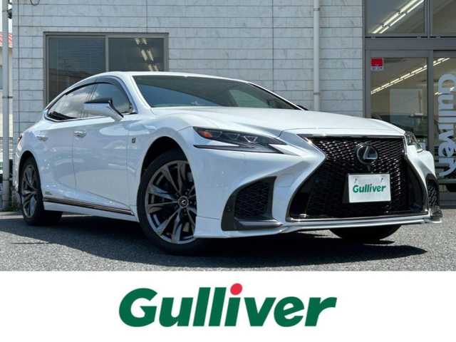 レクサス ＬＳ 500h Fスポーツ 福岡県 2018(平30)年 5.9万km ホワイトノーヴァガラスフレーク TRDエアロ(フロント)/ムーンルーフ/12.3インチメーカーナビ/　(AM/FM/CD/DVD/Bluetooth/Miracast/フルセグTV)/パノラミックビューモニター/バックカメラ/デジタルインナーミラー/レクサスセーフティシステム+A/・プリクラッシュセーフティ/・フロントクロストラフィックアラート/・レーントレーシングアシスト/・アダプティブハイビームシステム/・ロードサインアシスト/・レーダークルーズコントロール/・先行車発進告知/・ドライバー異常時停車支援システム/ブラインドスポットモニター/パワートランクリッド/ヘッドアップディスプレイ/パドルシフト/純正20インチアルミホイール/黒色レザーシート/メモリー付きパワーシート(全席)/シートヒーター/ベンチレーション(全席)/電動リヤサンシェード/ビルトインETC2.0/スペアキー×1/カードキー×1/保証書/取扱説明書/ナビ取扱説明書